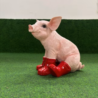 Varken zittend met rode laarzen